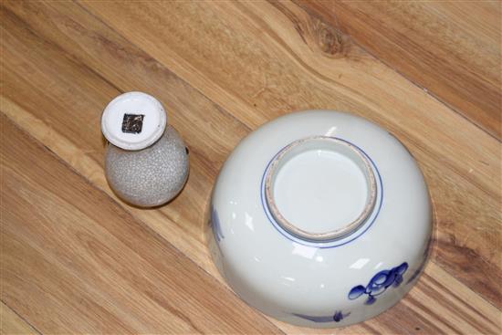 A Chinese crackle glaze vase, decorated in relief with a dragon, c.1910, height 17cm, a Japanese blue and white bowl and a pair of Japa